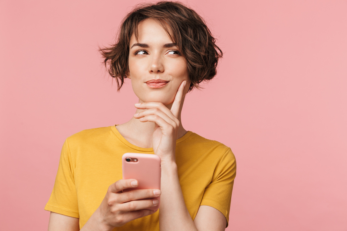 Girl with Hand on Chin and Smartphone